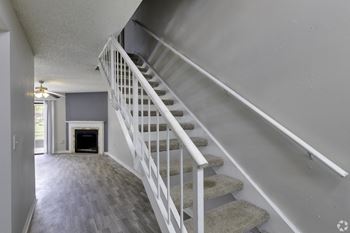 the stairway up to the second floor of a house